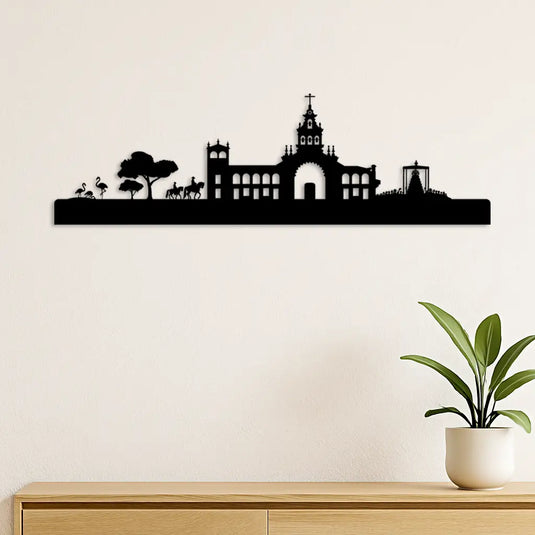 Una representación de la aldea del Rocío en Almonte, Huelva, donde se ve la ermita del Rocío con la virgen procesionando entre la multitud de peregrinos