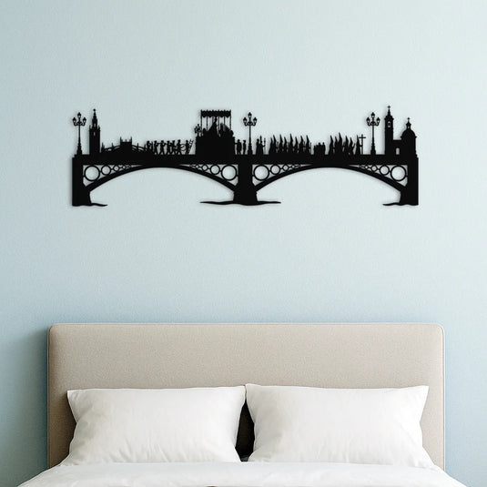 Silueta de madera de la Virgen de la Esperanza de Triana sobre el Puente de Triana en Sevilla, decorando una habitación moderna con estilo elegante.