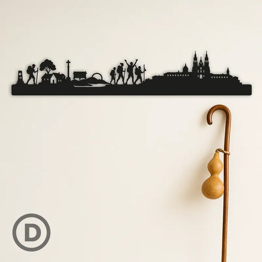 Silueta decorativa del Camino de Santiago con peregrinos y la Catedral de Santiago, en acabado metálico para colgar en pared