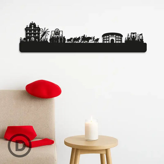 Silueta representa las fiestas de san fermin, desde el chupinazo en la plaza del ayuntamiento, el canto de los corredores a la hornacina de San Fermín, el encierro hasta la plaza de toros y el "pobre de mi" final